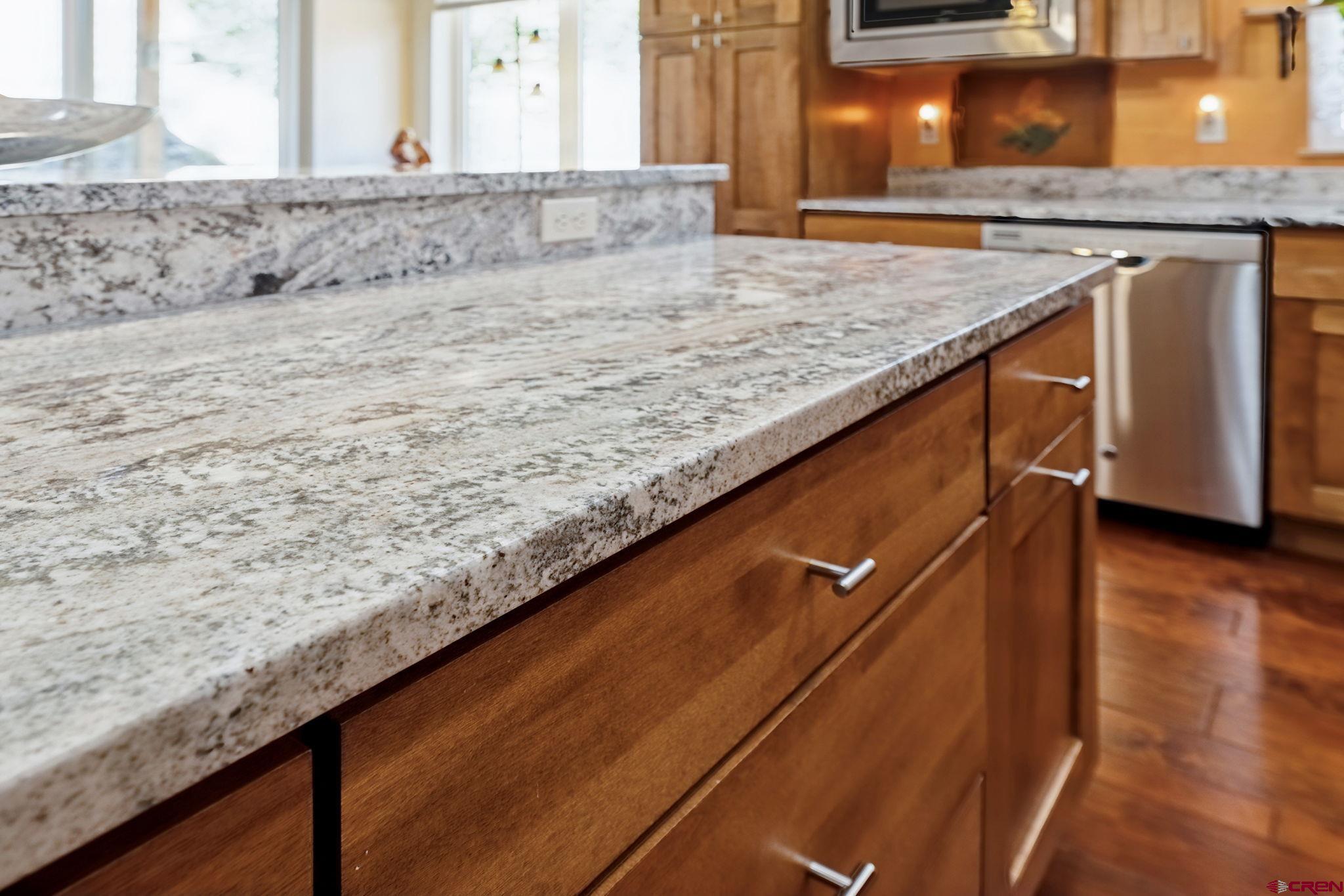 67 Mountain Stream Court Durango, CO 81301 - Photo 10 of 35 a view of kitchen counter space and wooden floor