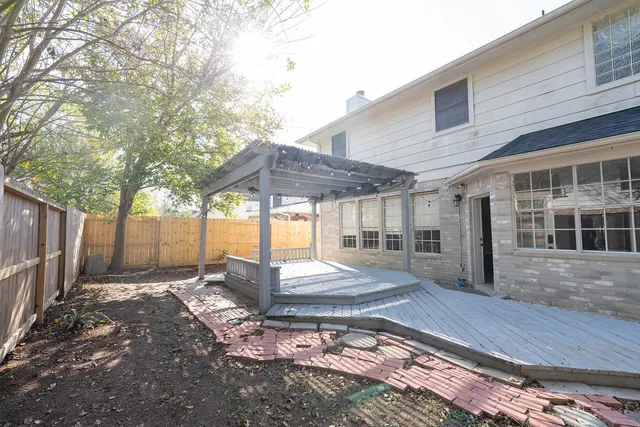 a view of a backyard with a patio