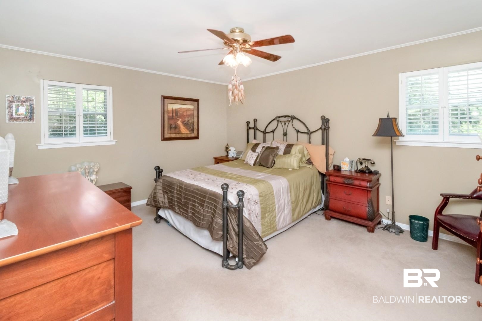 8220 Fordham Road Mobile, AL 36619 - Photo 15 of 41 Bedroom featuring baseboards, multiple windows, light carpet, and crown molding
