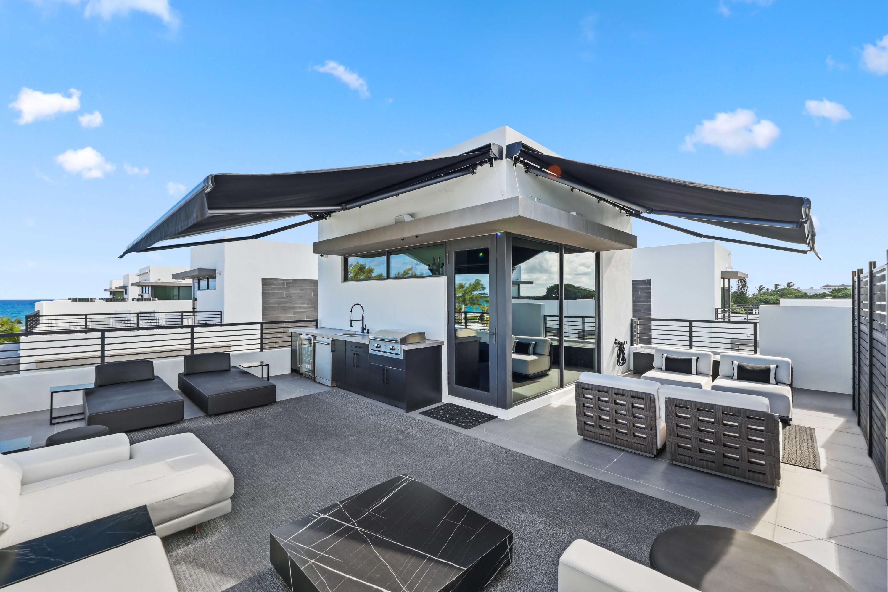 11501 Old Ocean Boulevard Ocean Ridge, FL 33435 - Photo 60 of 63 Retractable Shades on Roofdeck