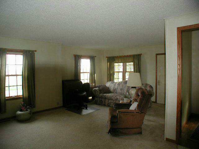 9478 North Excelsior Road Lena, IL 61048 - Photo 5 of 9 a living room with furniture chess table and a window