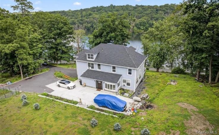556 Lakes Road Monroe, NY 10950 - Photo 21 of 22 Aerial view of property and surrounding area featuring a forest