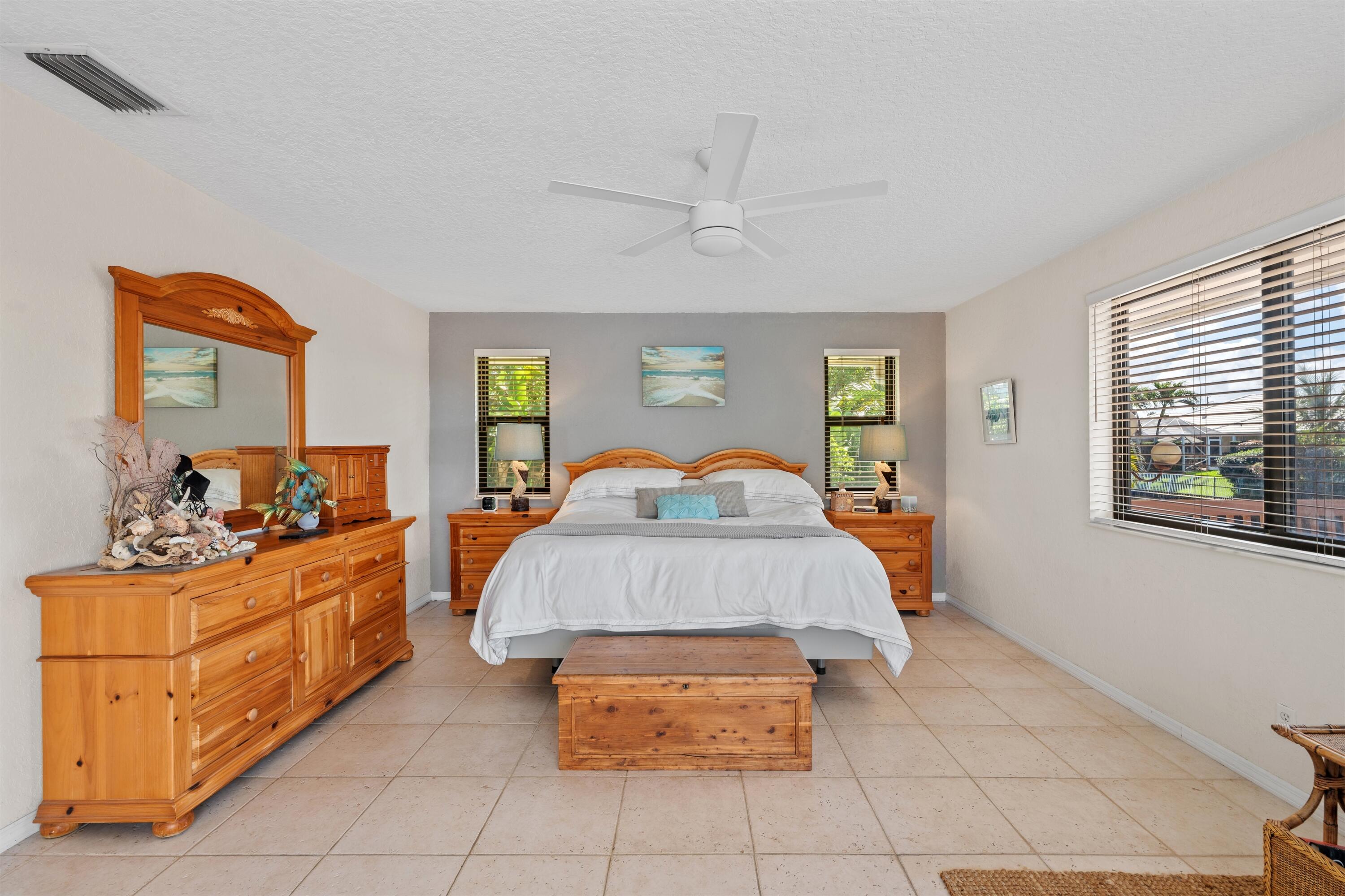 1223 Pepperridge Terrace Boca Raton, FL 33486 - Photo 14 of 34 a bedroom with a bed and window