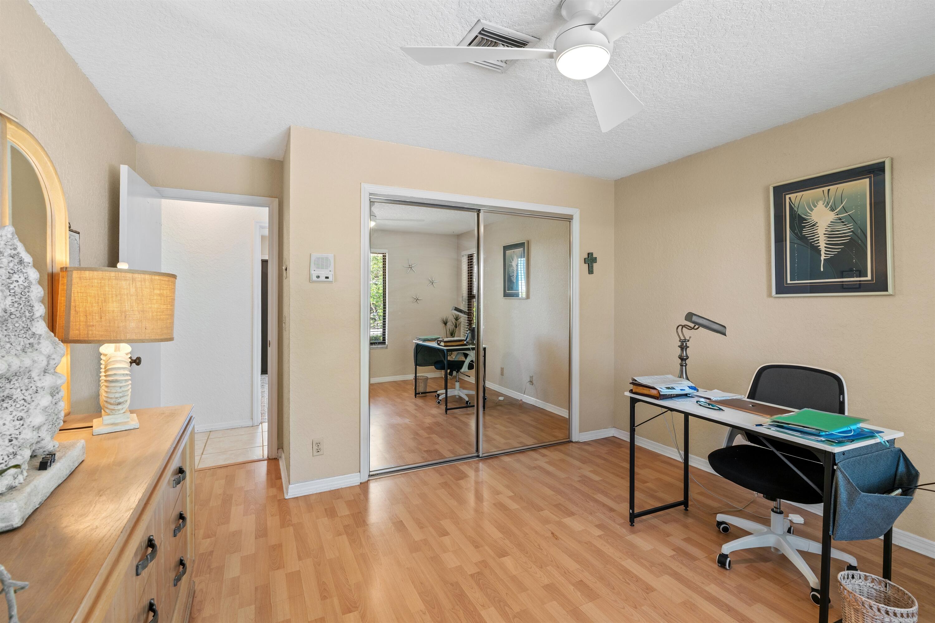1223 Pepperridge Terrace Boca Raton, FL 33486 - Photo 22 of 34 a room with furniture and a wooden floor