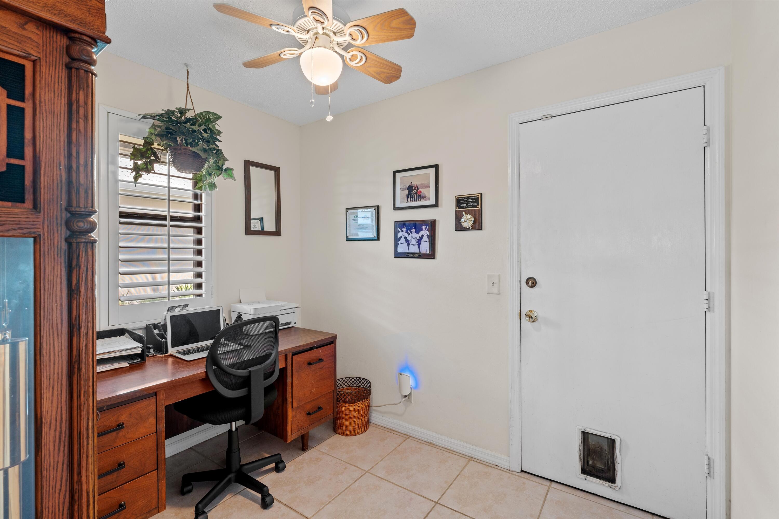 1223 Pepperridge Terrace Boca Raton, FL 33486 - Photo 24 of 34 a view of a workspace with furniture and a window
