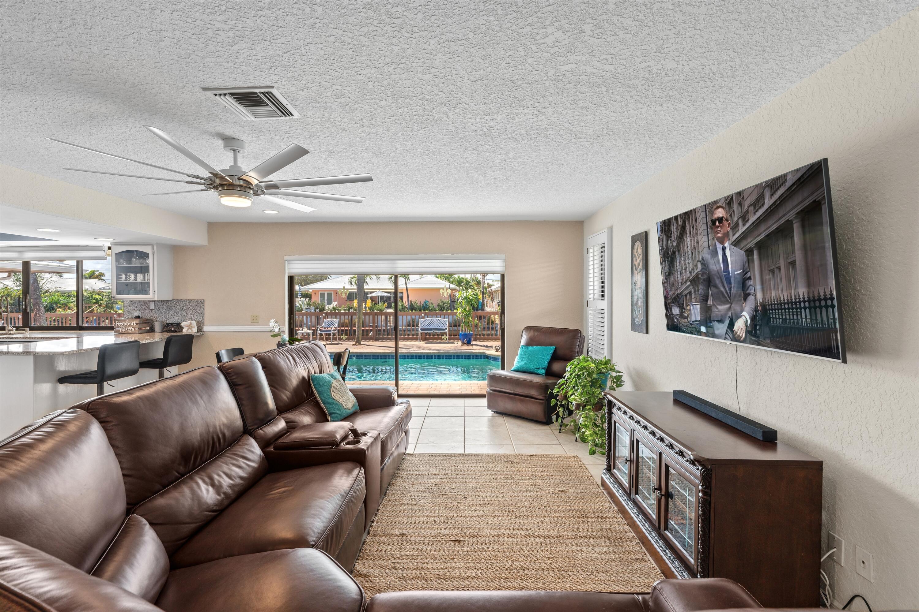 1223 Pepperridge Terrace Boca Raton, FL 33486 - Photo 5 of 34 a living room with furniture and a large window