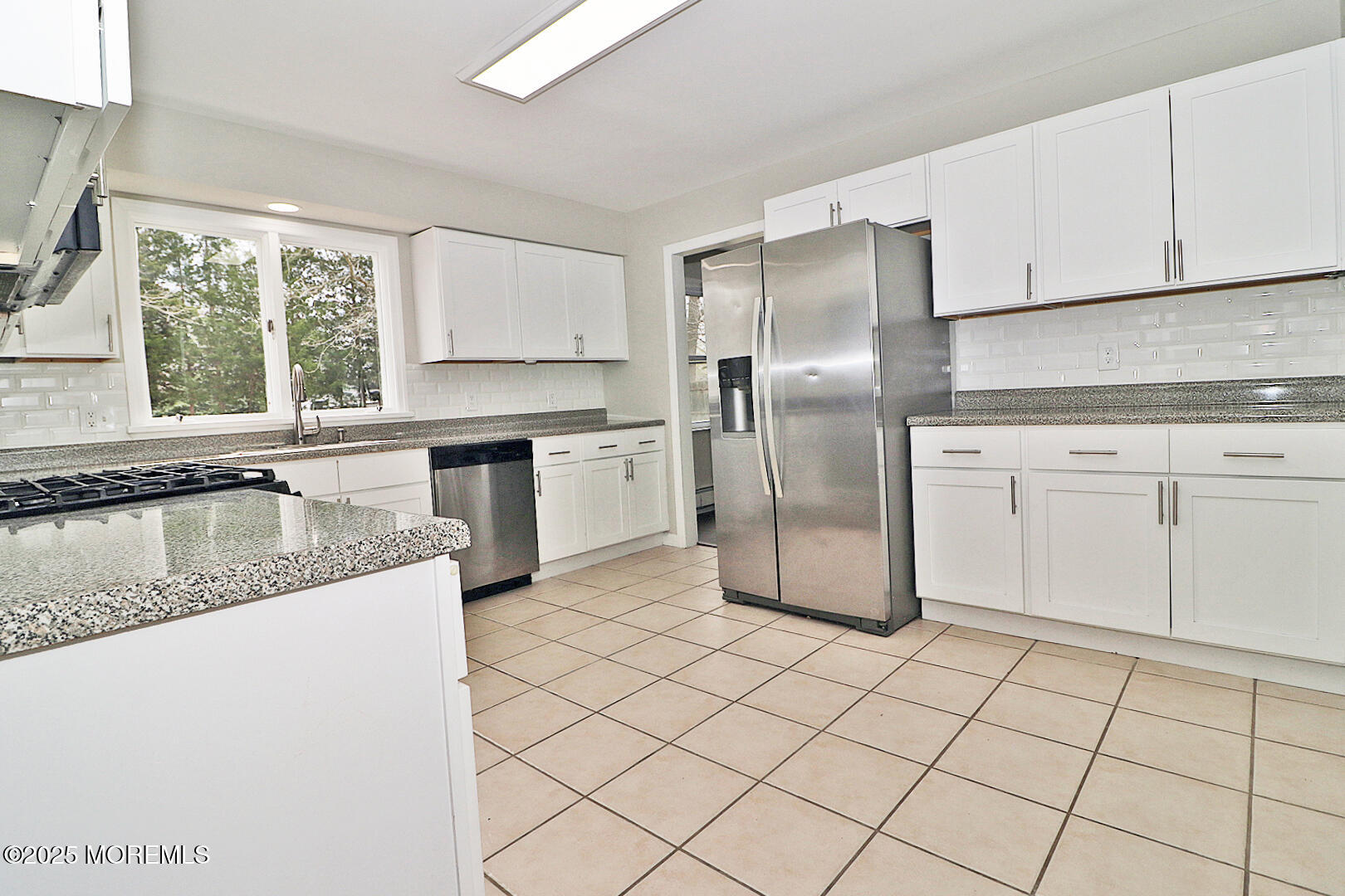 472 Steuben Avenue Forked River, NJ 08731 - Photo 25 of 50 a kitchen with stainless steel appliances granite countertop a refrigerator sink and cabinets