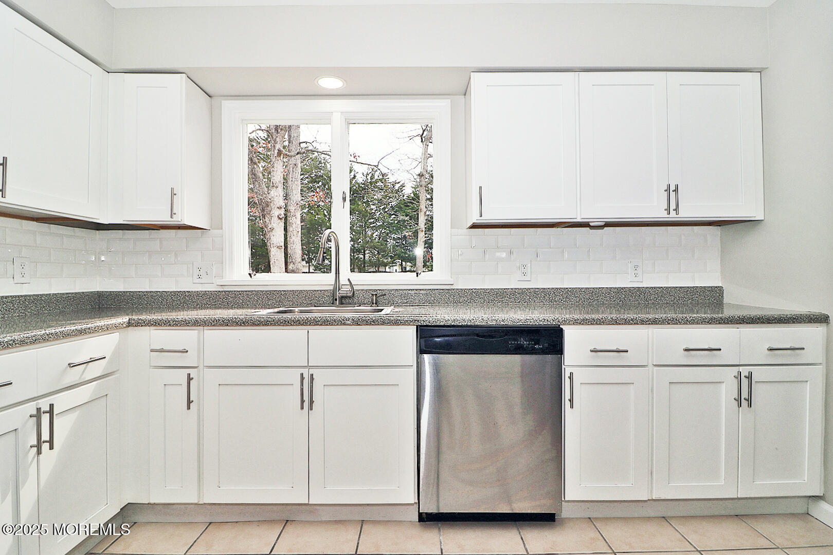 472 Steuben Avenue Forked River, NJ 08731 - Photo 27 of 50 a kitchen with white cabinets and a window
