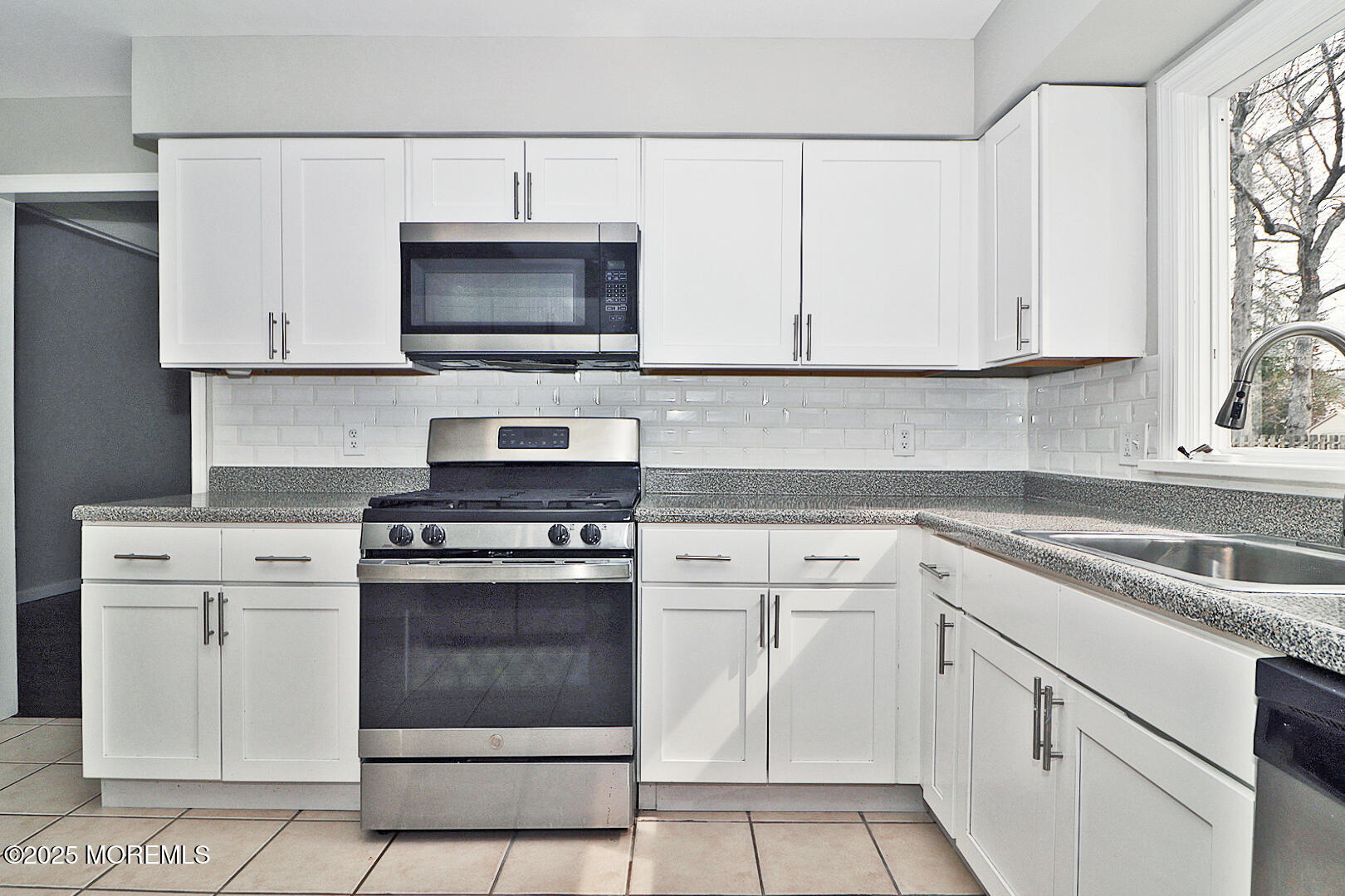 472 Steuben Avenue Forked River, NJ 08731 - Photo 28 of 50 a kitchen with white cabinets and appliances