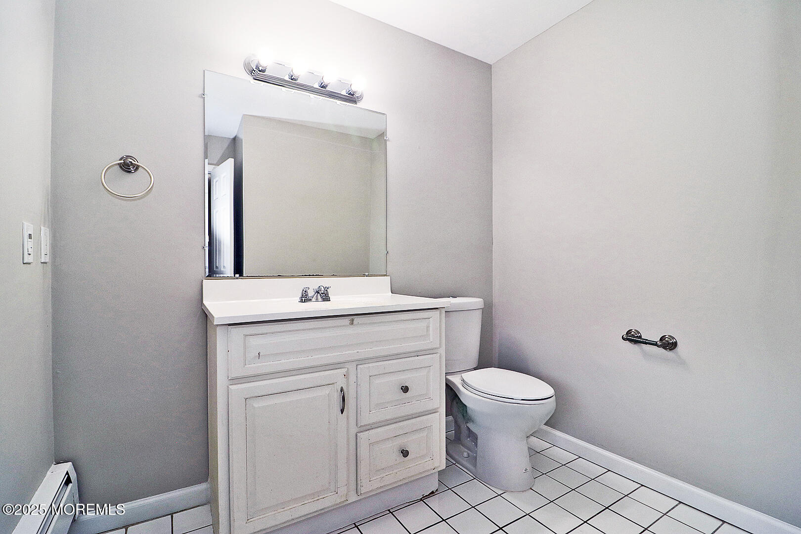 472 Steuben Avenue Forked River, NJ 08731 - Photo 35 of 50 a bathroom with a toilet sink and mirror