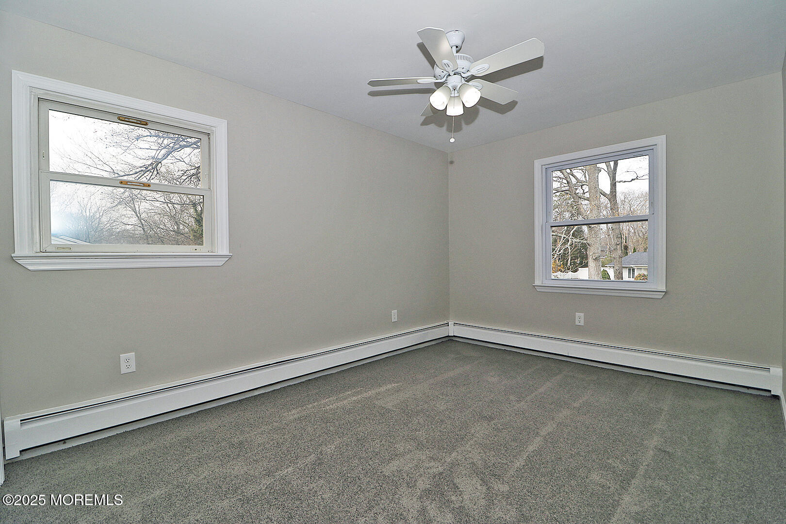 472 Steuben Avenue Forked River, NJ 08731 - Photo 47 of 50 an empty room with windows and fan