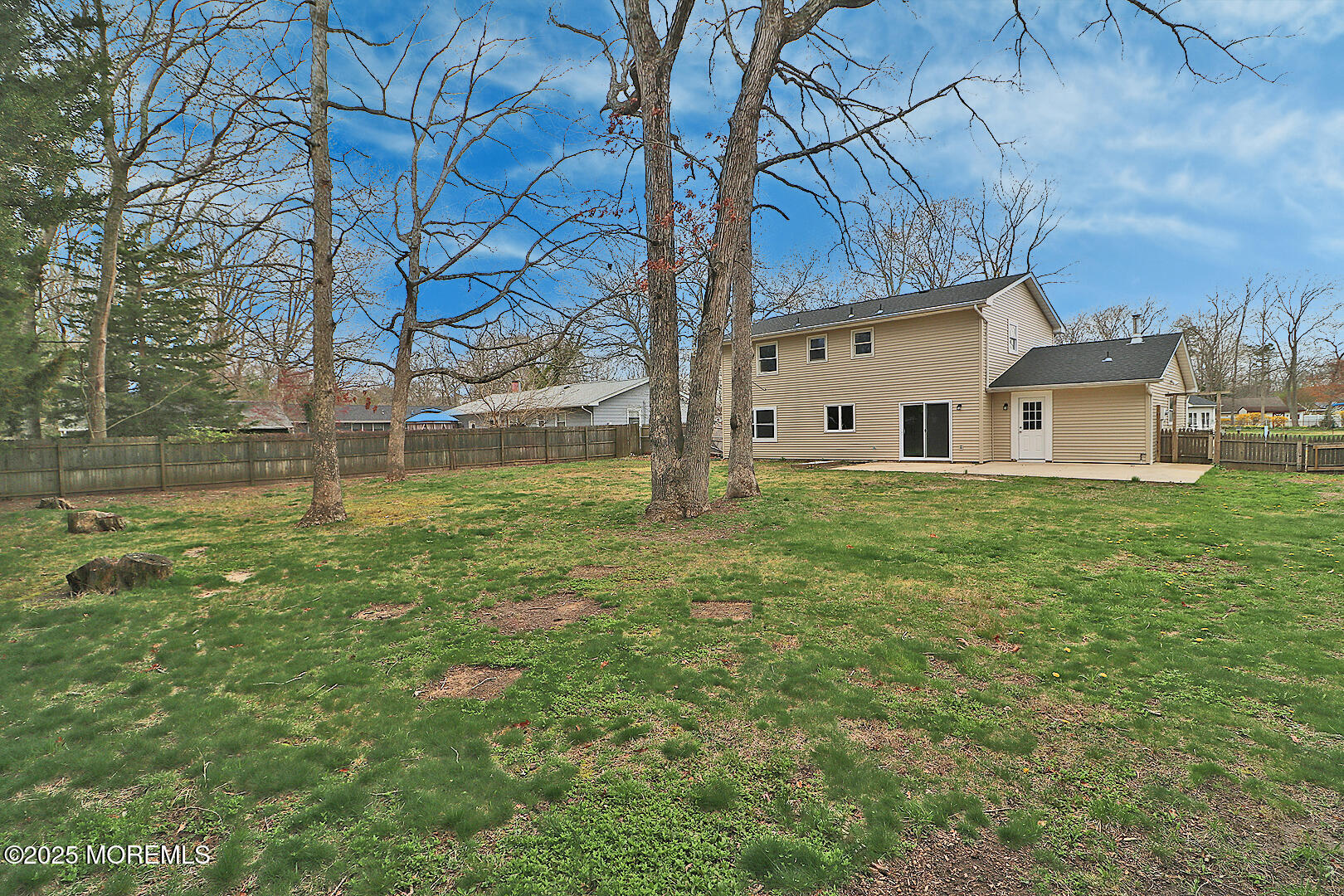 472 Steuben Avenue Forked River, NJ 08731 - Photo 7 of 50 a white house with a yard and large trees