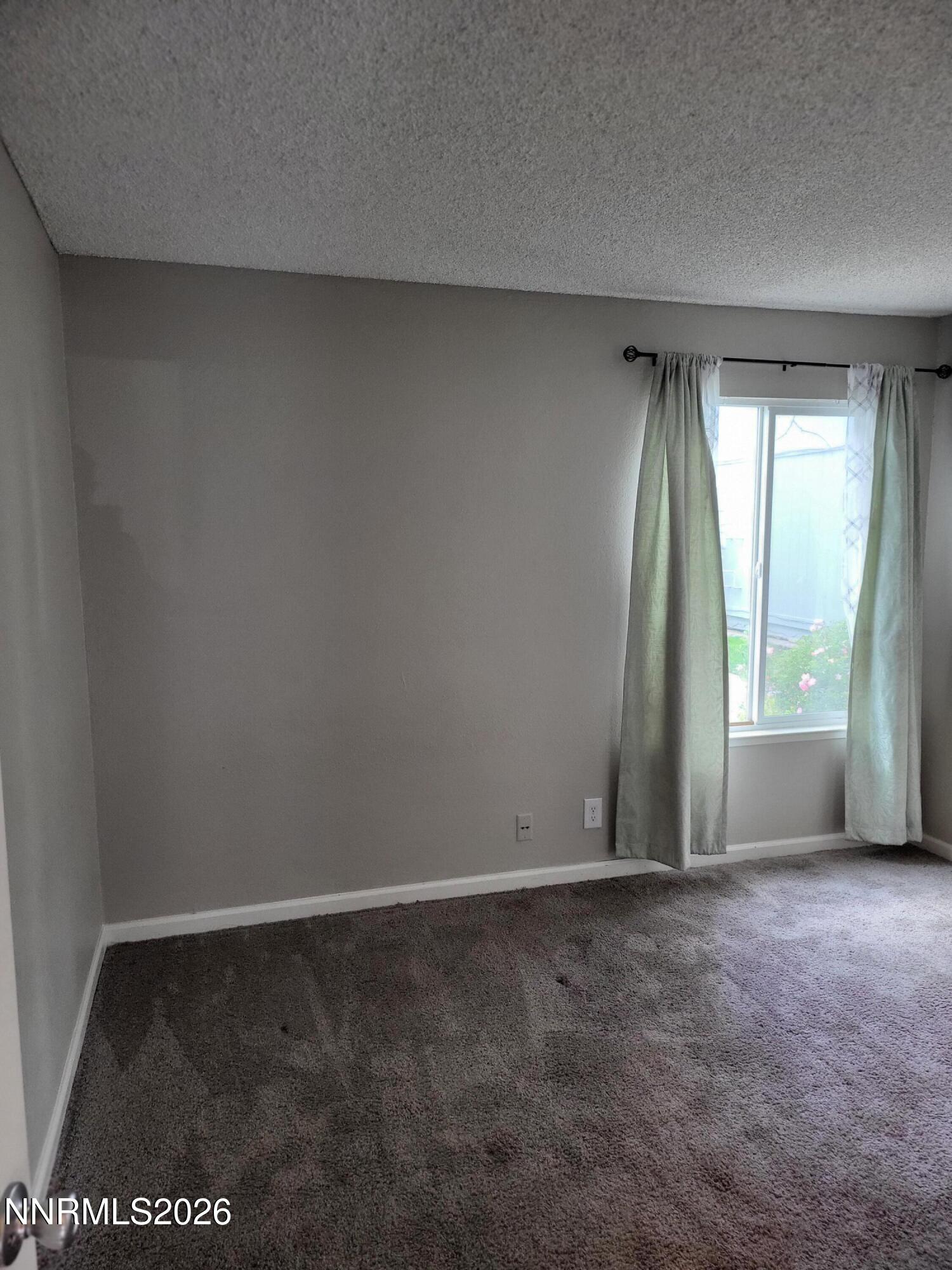 4606 Neil Road, Unit 197 Reno, NV 89502 - Photo 8 of 26 a view of room with window