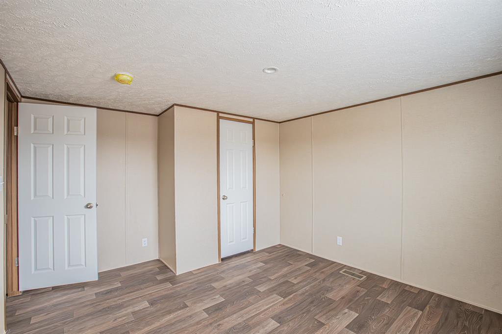 150 Leech Road Poolville, TX 76487 - Photo 24 of 34 a view of an empty room
