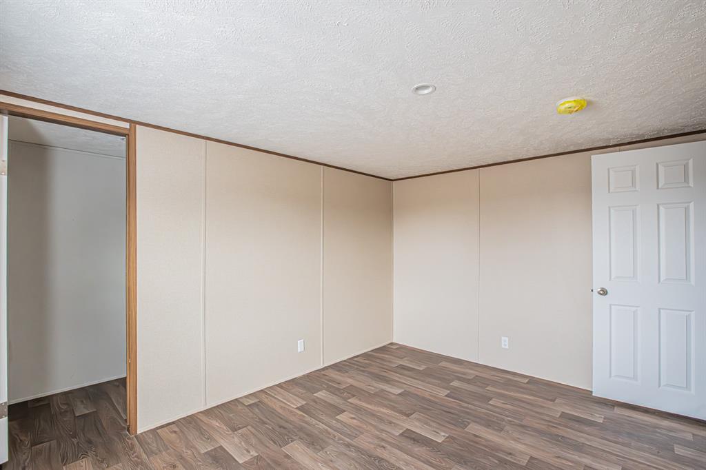 150 Leech Road Poolville, TX 76487 - Photo 27 of 34 a view of an empty room