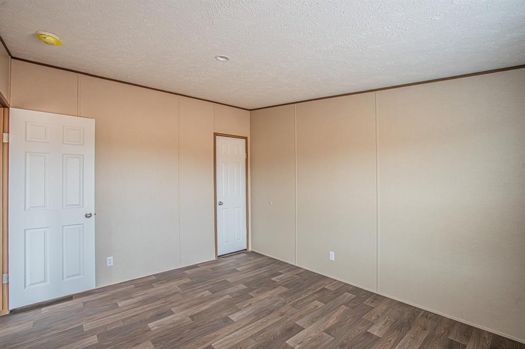 150 Leech Road Poolville, TX 76487 - Photo 33 of 34 a view of an empty room