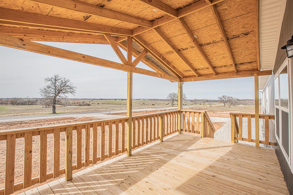 150 Leech Road Poolville, TX 76487 - Photo 5 of 34 a view of ocean from a balcony