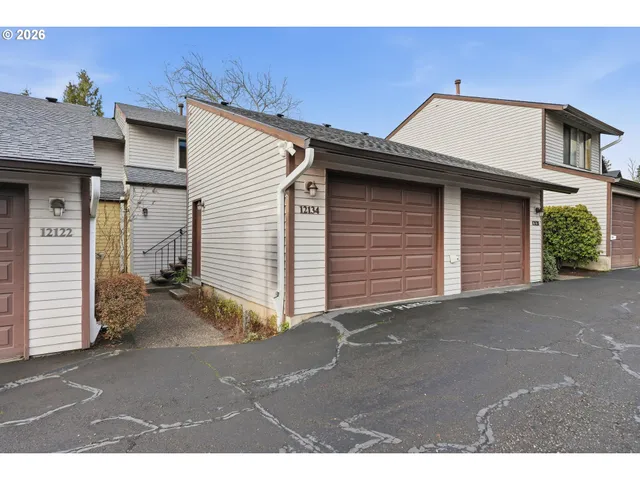 a terrace of a house with outdoor seating