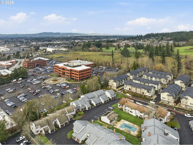an aerial view of a city with lots of residential buildings
