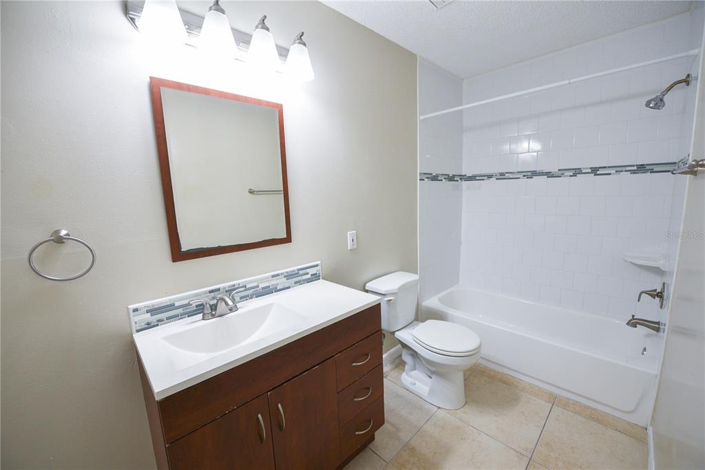455 Alt 19, Unit 92 Palm Harbor, FL 34683 - Photo 19 of 19 a bathroom with a sink a toilet and shower