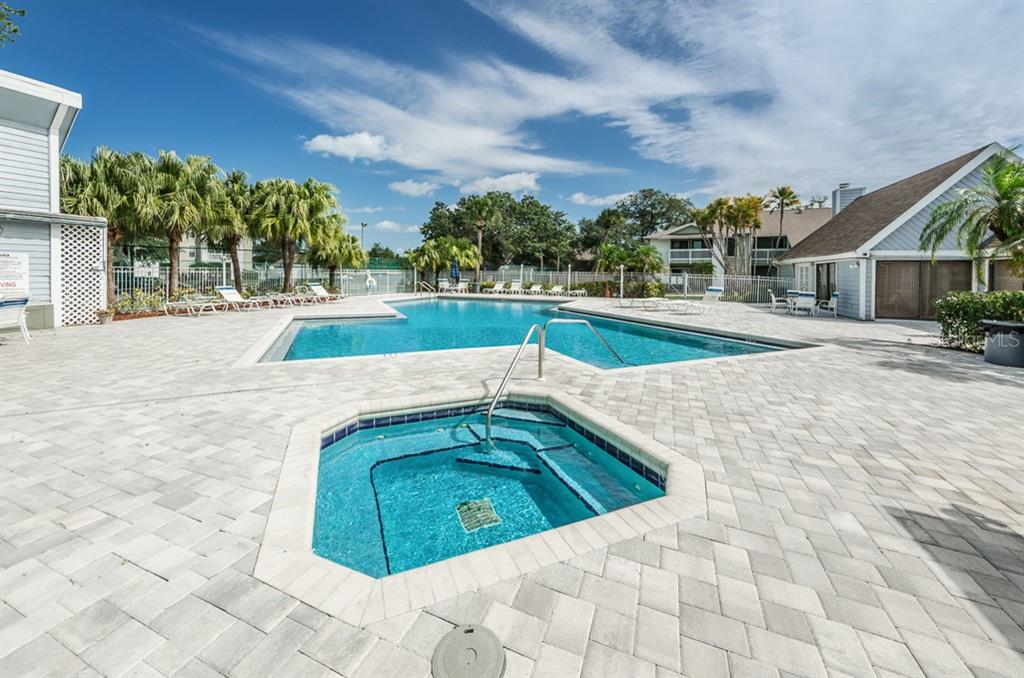 455 Alt 19, Unit 92 Palm Harbor, FL 34683 - Photo 3 of 19 a view of swimming pool with a yard