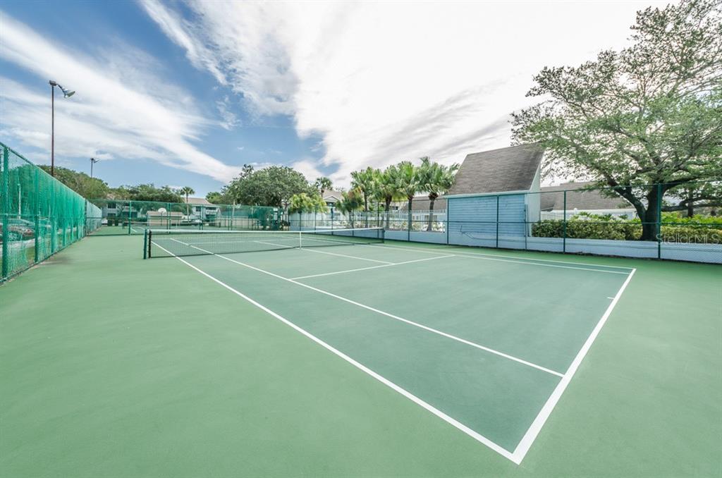 455 Alt 19, Unit 92 Palm Harbor, FL 34683 - Photo 4 of 19 a view of a tennis court