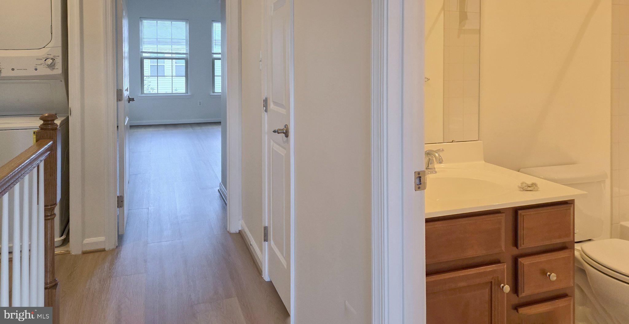 7339 Old Calvary Road Hanover, MD 21076 - Photo 9 of 22 Bright and inviting hallway view.