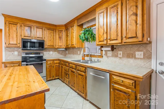 $585,000 | 8230 Quail Hollow Drive, Harrisburg, NC 28075