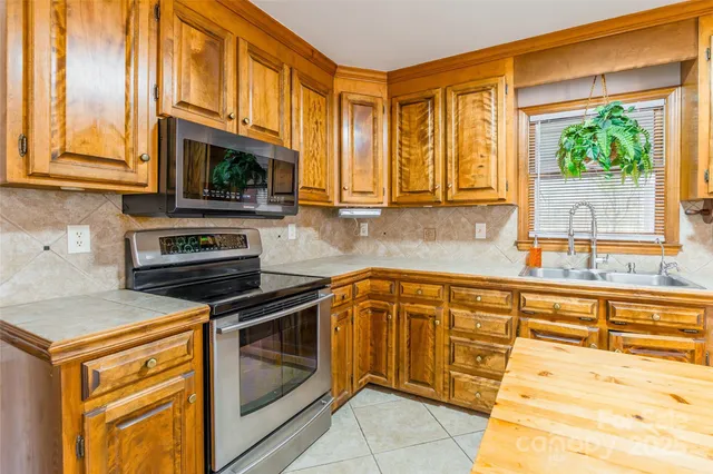 $585,000 | 8230 Quail Hollow Drive, Harrisburg, NC 28075