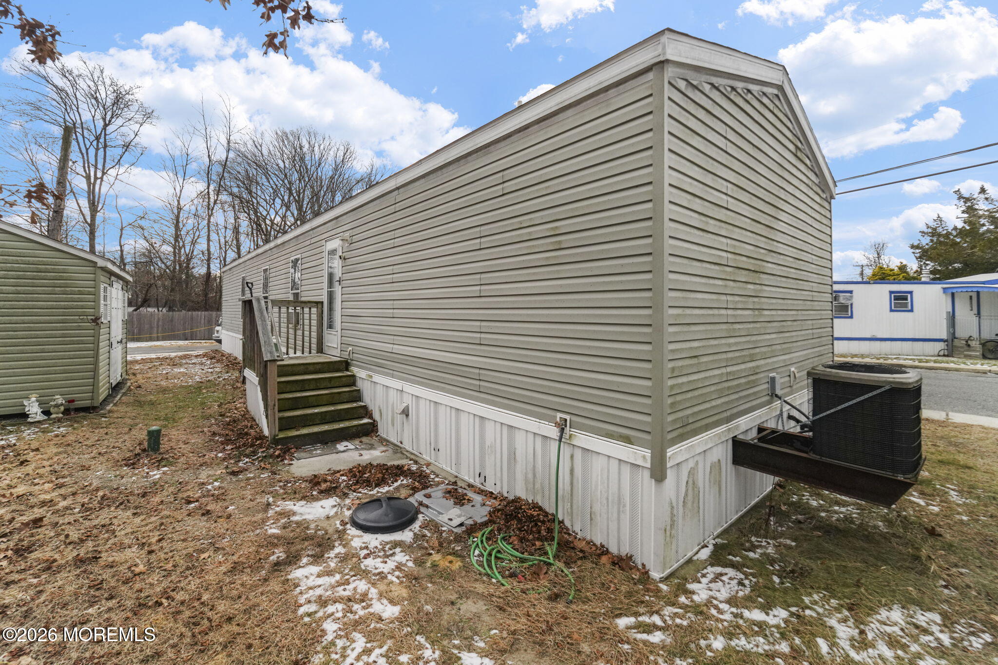10 Citrus Lane Howell, NJ 07731 - Photo 17 of 20 a view of a house with backyard and wooden fence