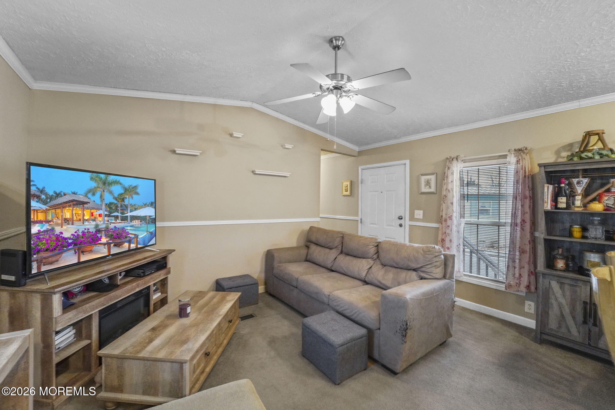 10 Citrus Lane Howell, NJ 07731 - Photo 4 of 20 a living room with furniture and a flat screen tv