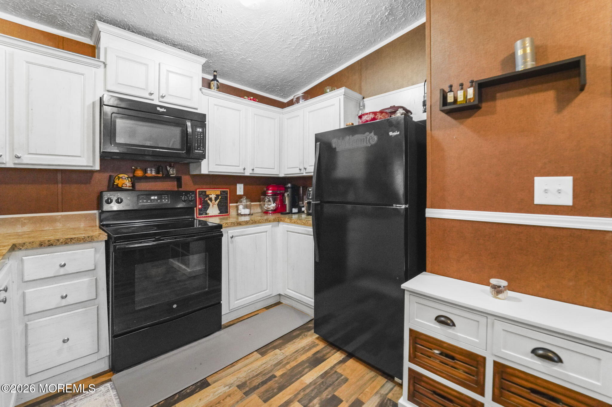 10 Citrus Lane Howell, NJ 07731 - Photo 6 of 20 a kitchen with stainless steel appliances a refrigerator stove and microwave