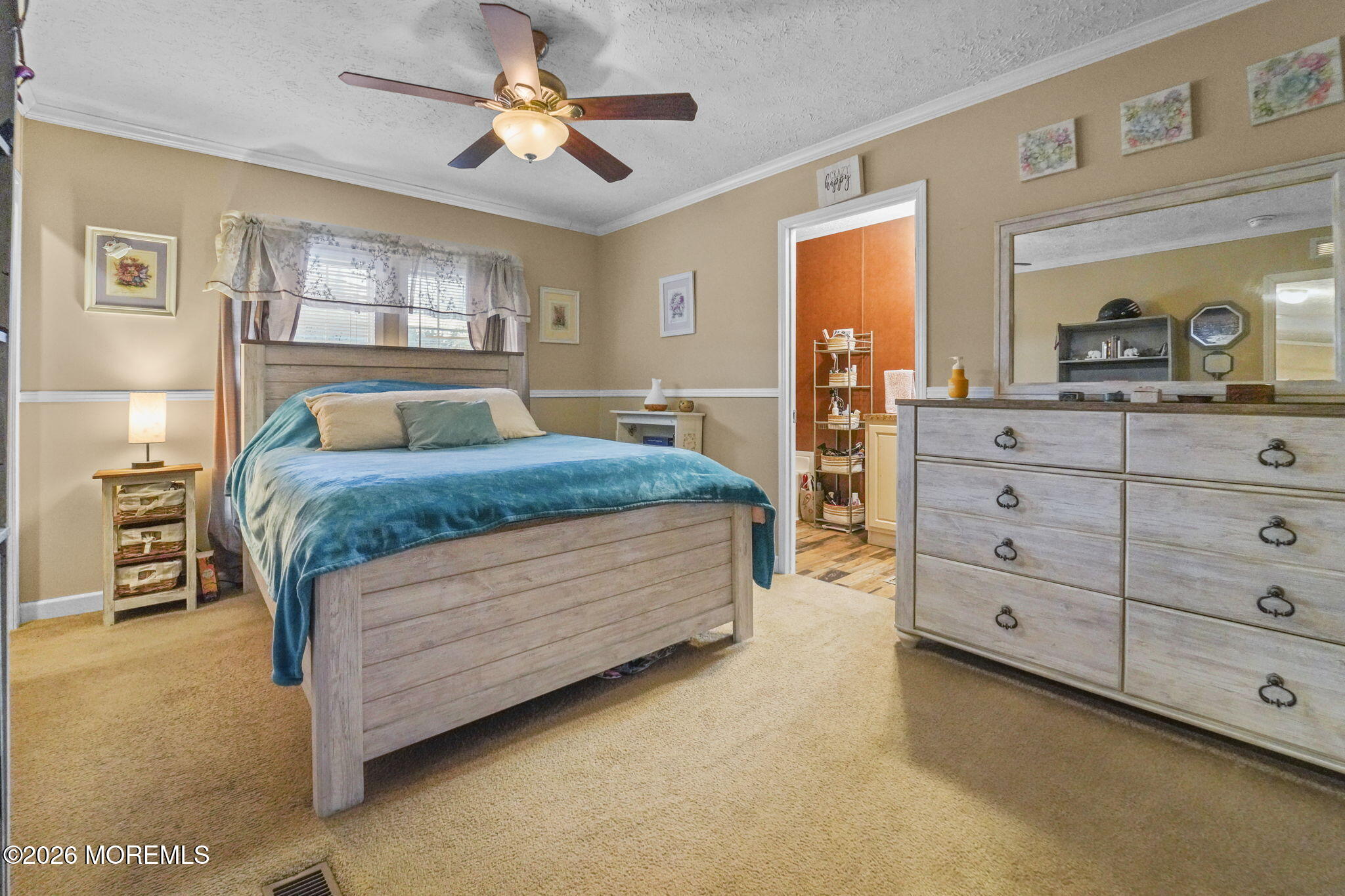 10 Citrus Lane Howell, NJ 07731 - Photo 8 of 20 a bedroom with a bed and a dresser