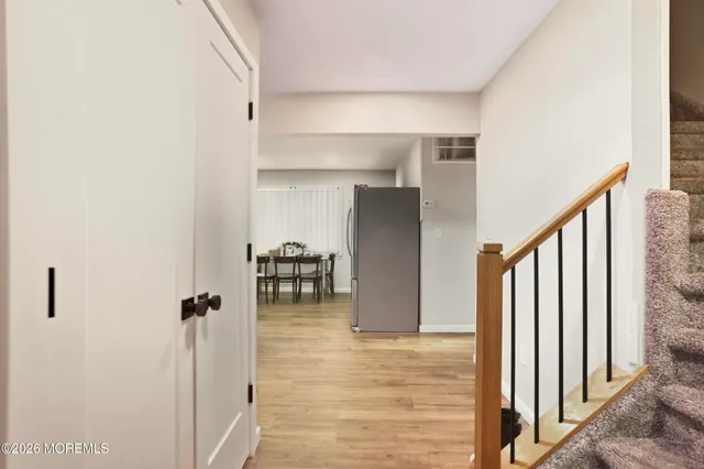 a view of staircase with white walls