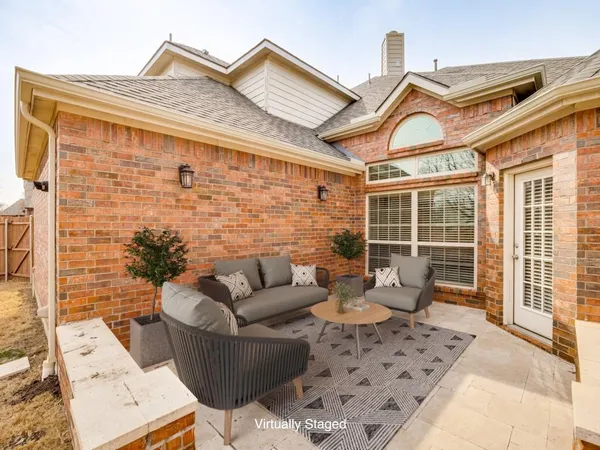 a building outdoor space with patio furniture