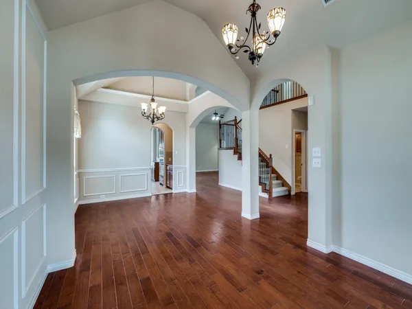 a view of a livingroom with wooden floor