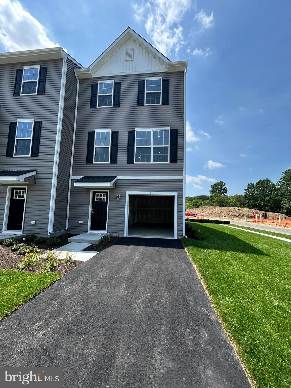 63 Barnes Way Sicklerville, NJ 08081 - Photo 1 of 49 a front view of a house with a yard