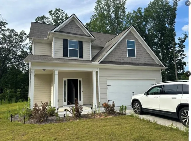a view of a yard in front of house
