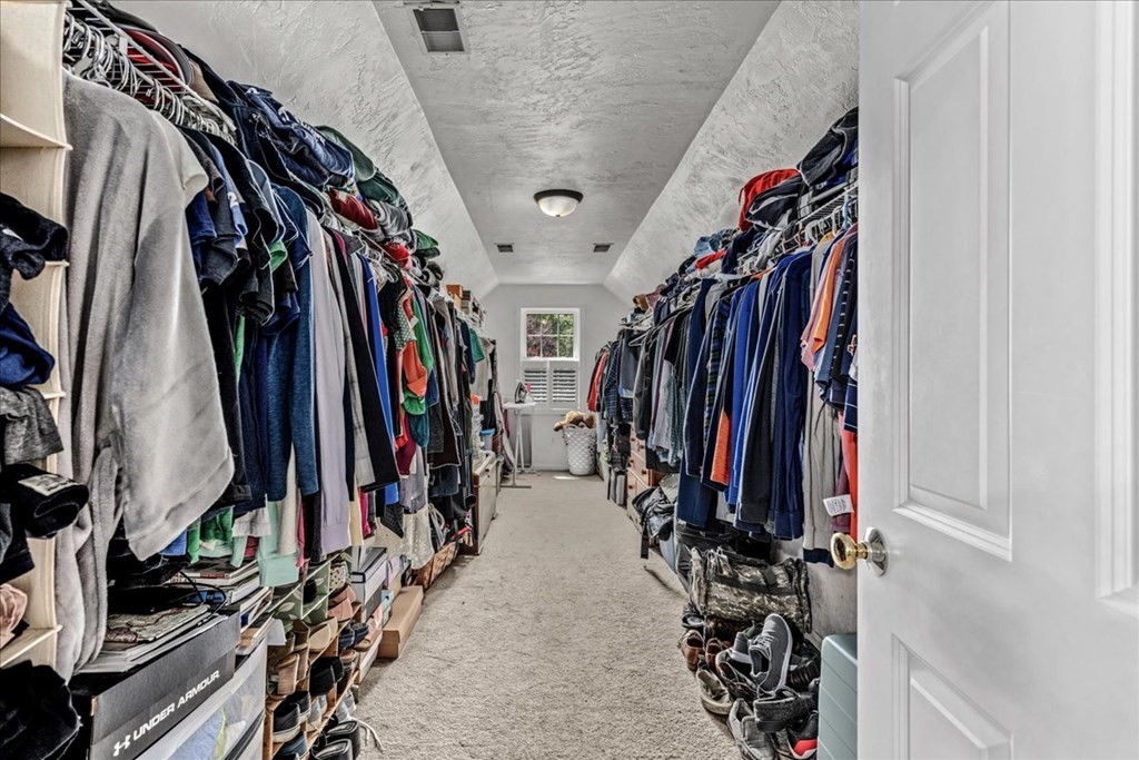 2 Harding Lane Sturbridge, MA 01518 - Photo 23 of 42 a view of walk in closet with clothes