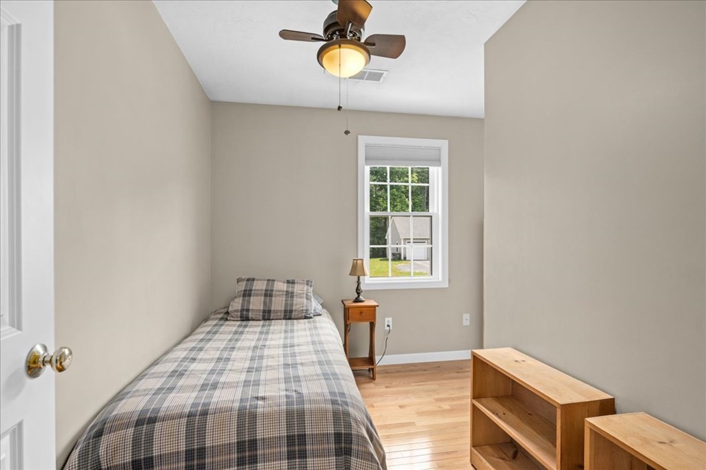 2 Harding Lane Sturbridge, MA 01518 - Photo 25 of 42 a bedroom with a bed and window