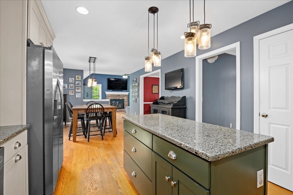 2 Harding Lane Sturbridge, MA 01518 - Photo 6 of 42 a kitchen with stainless steel appliances granite countertop sink stove and refrigerator