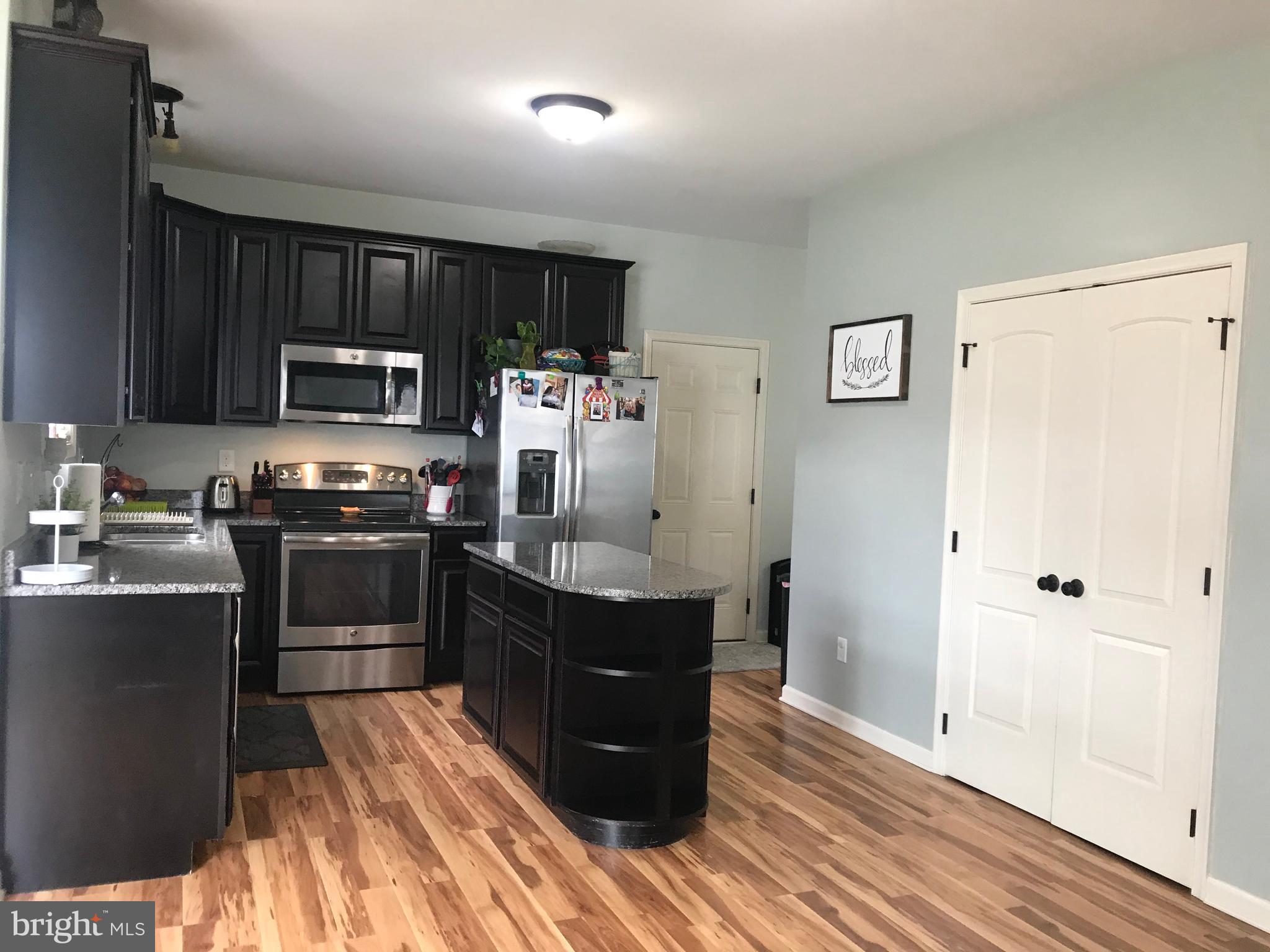 214 Gibson Road Inwood, WV 25428 - Photo 2 of 38 Gourmet kitchen with stainless steel appliances
