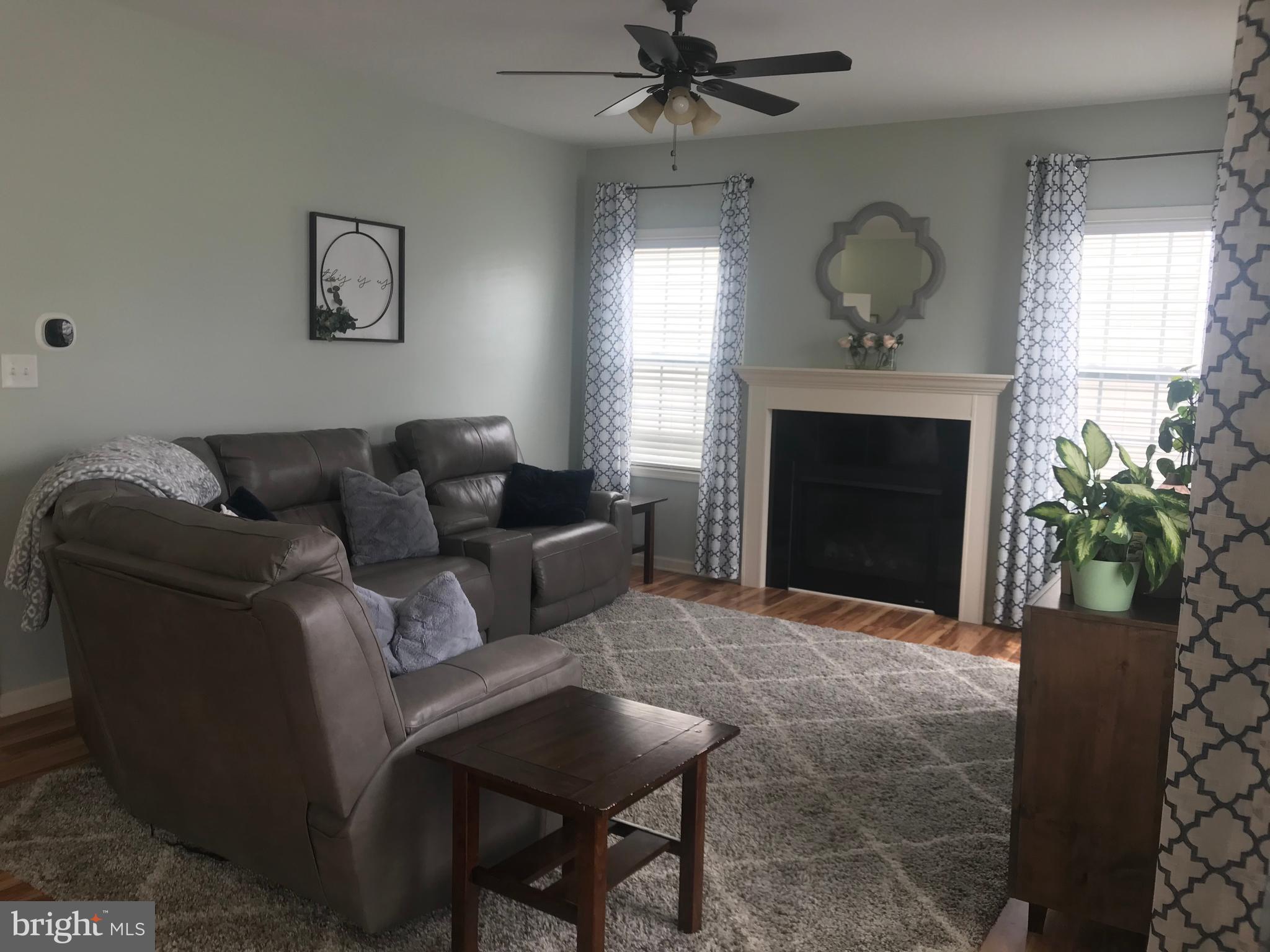 214 Gibson Road Inwood, WV 25428 - Photo 4 of 38 Family room with Fireplace