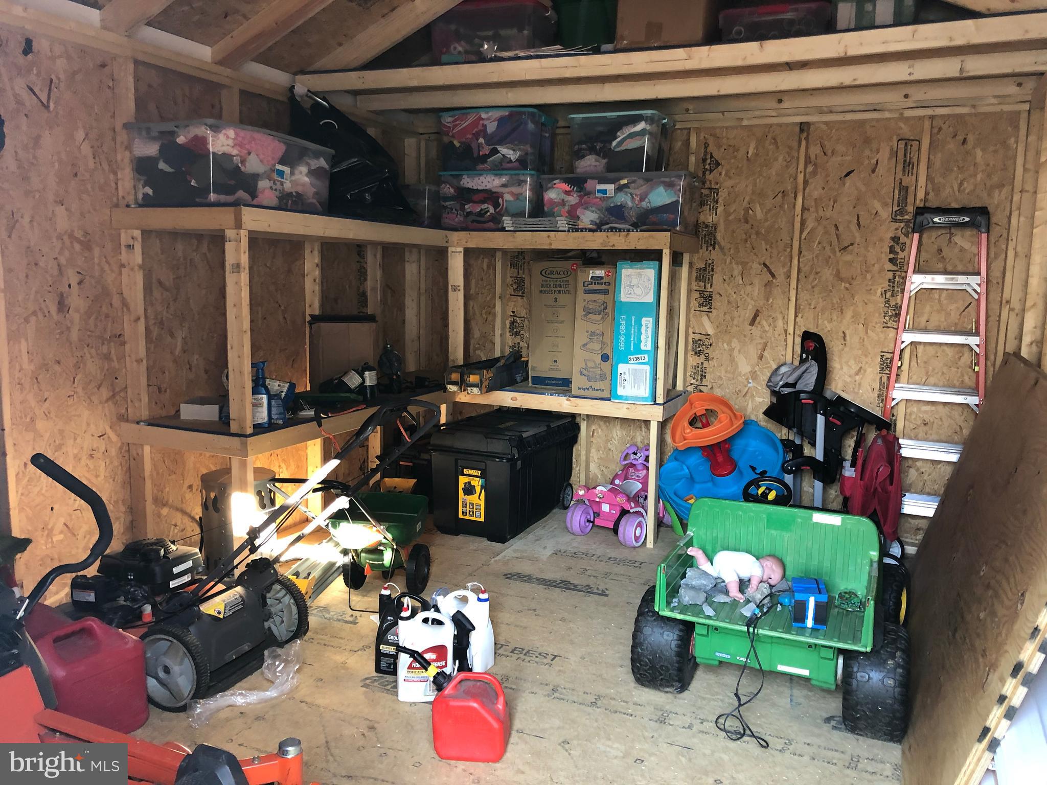 214 Gibson Road Inwood, WV 25428 - Photo 33 of 38 Lots of storage for mowers and garden tools