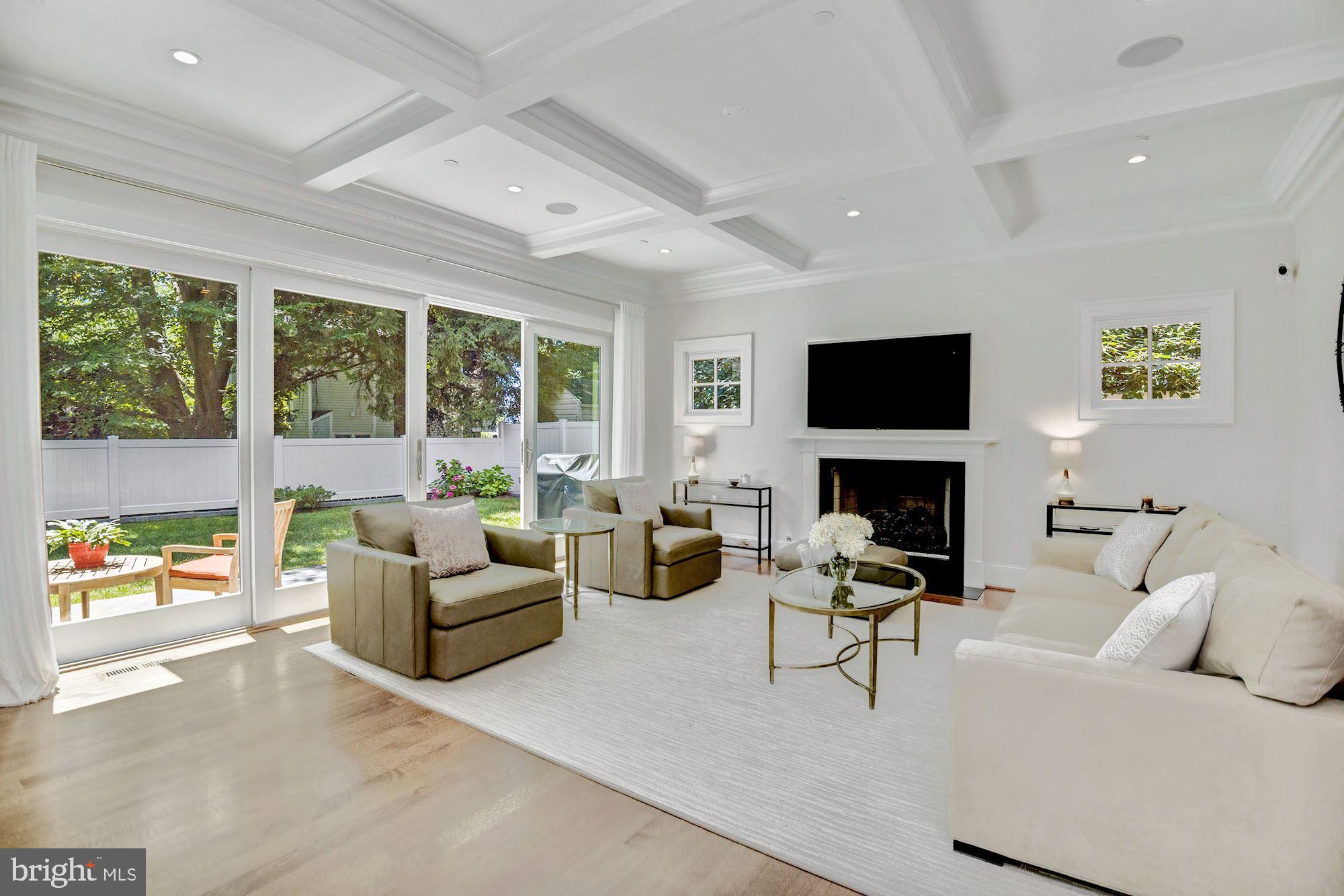 7006 Exeter Road Bethesda, MD 20814 - Photo 25 of 75 FAMILY ROOM WITH TRUE GAS LOG FIREPLACE