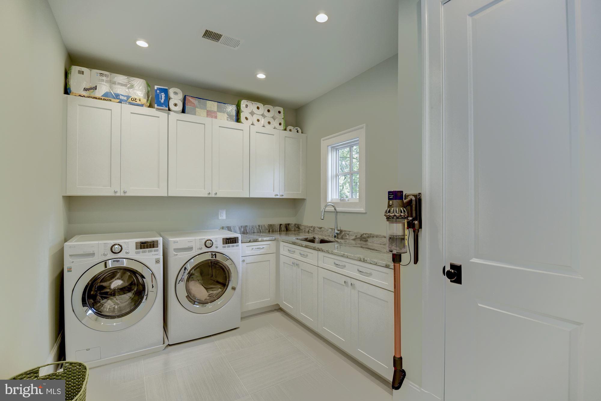 7006 Exeter Road Bethesda, MD 20814 - Photo 50 of 75 SPACIOUS LAUNDRY ROOM W/CLOSET & CABINETRY