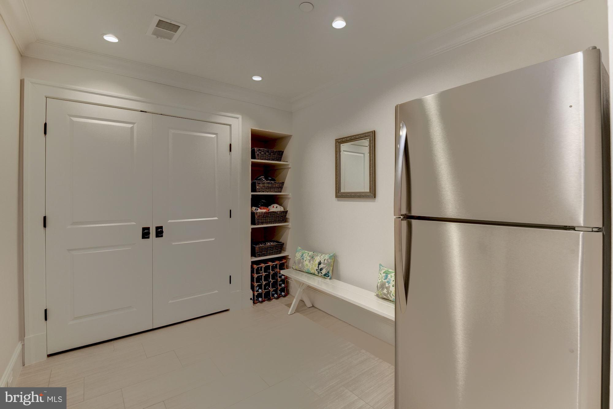 7006 Exeter Road Bethesda, MD 20814 - Photo 62 of 75 LOWER LEVEL MUDROOM W/FRIDGE & MORE CLOSETS