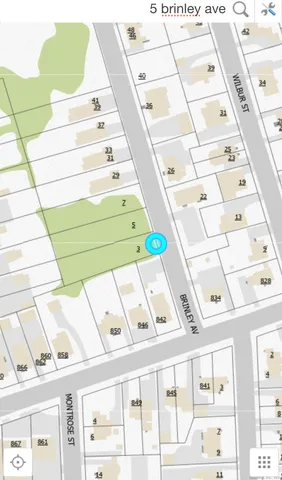 a view of a balcony with a book and a table