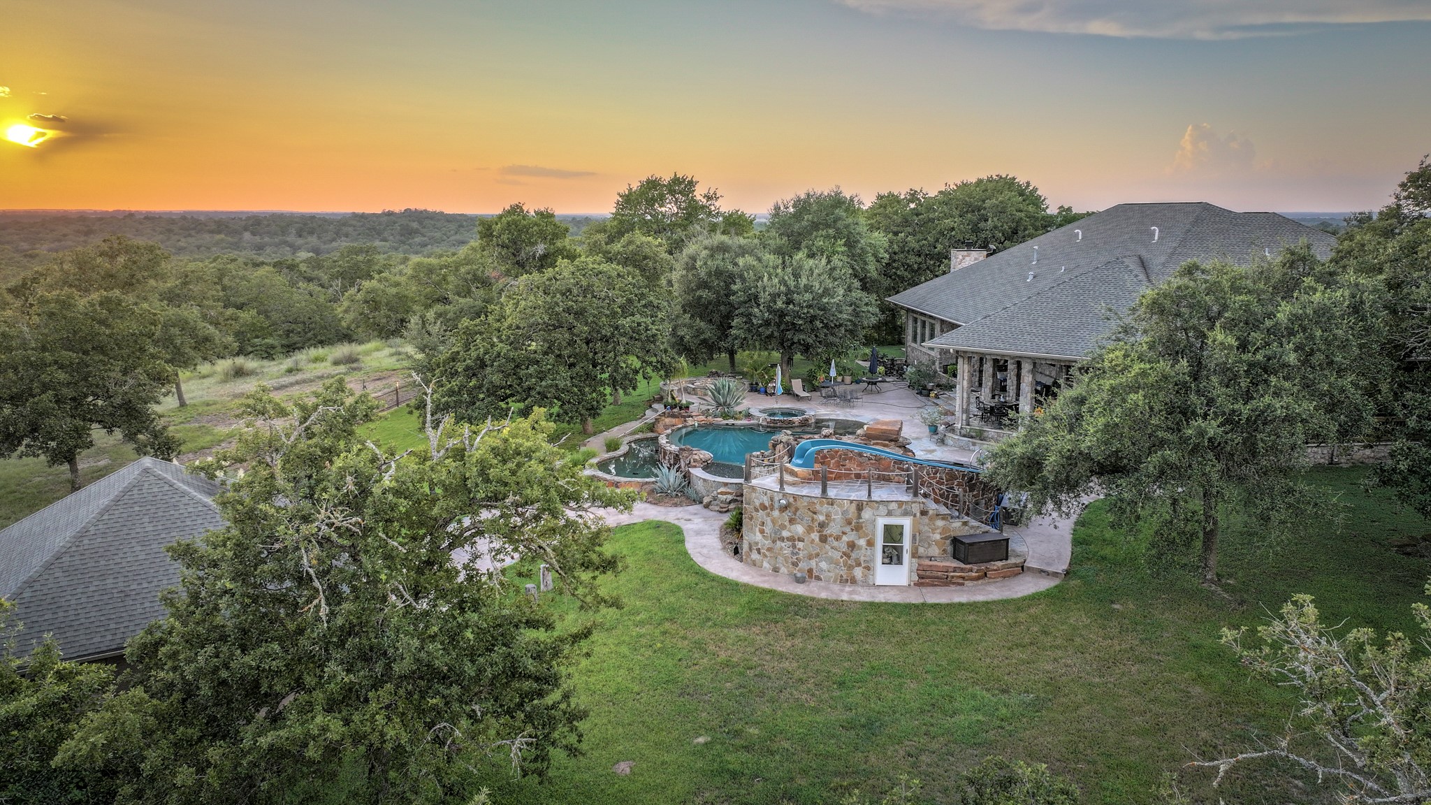 a view of a chairs and table in the terrace