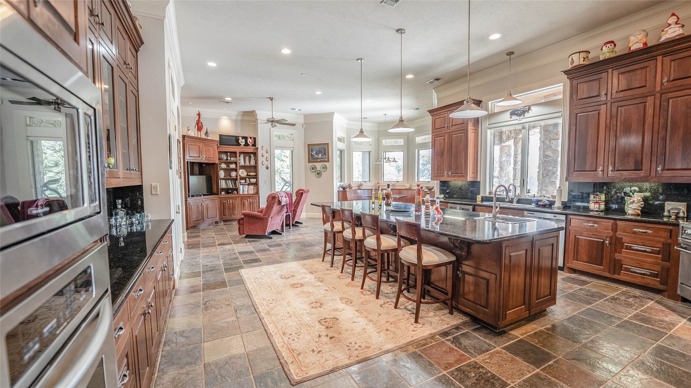 2042 22 Hills Road Gause, TX 77857 - Photo 19 of 50 a large dining hall with stainless steel appliances granite countertop a stove and a sink